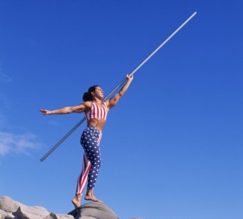 A woman prepares to throw a javelin.